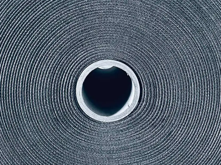 End of a roll showing the tightly wound layered material